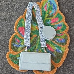 Stylish Blue Crossbody Bag with Patterned Strap